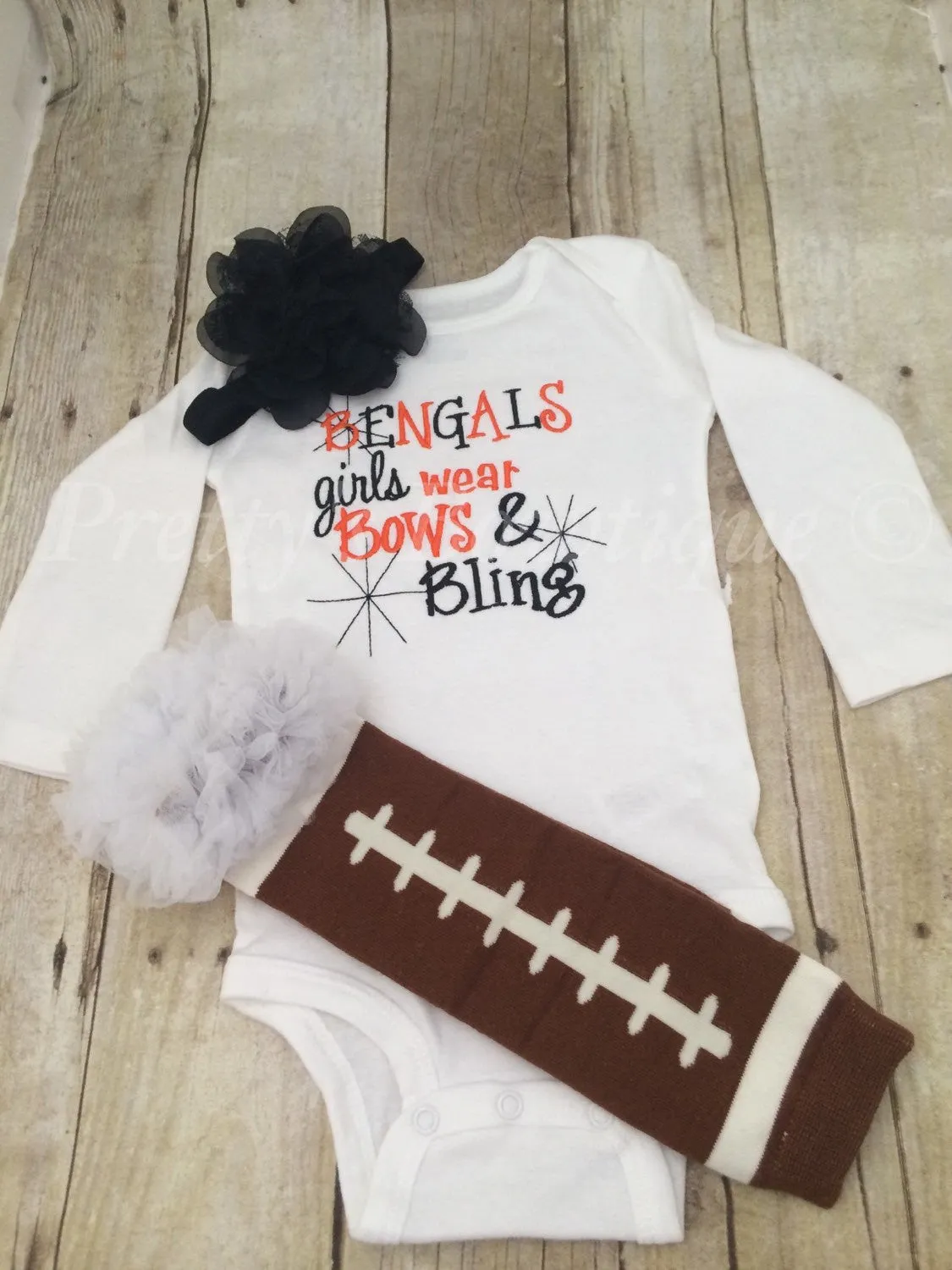 Bengals inspired girls like bling set with ruffled football leg warmers and bow.